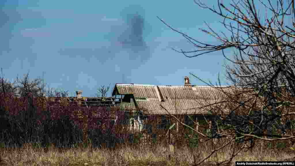 As RFE/RL photojournalist Andriy Dubchak walked through Vodyane on March 26, a series of explosions, followed by an intense burst of shooting broke out on the outskirts of the village. As Dubchak watched, this column of smoke drifted into the sky. 