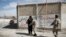 PAKISTAN -- Mohammad Bakir Hazara, 18, a carpenter, poses for a photograph at his workshop in Mariabad, Quetta, Pakistan, June 19, 2019.