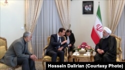 While FM Zarif is absent from Assad's meeting with Rouhani February 25, General Soleimani was sitting in.