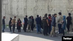 Small rally of families of workers detained for participation in protests in front of Tehran's notorious Evin Prison. Undated photo. 