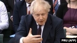 Boris Johnson vorbind la comisia de politică externă Parlamentului de la Londra, 21 martie 2018.