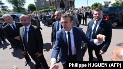 French President Emmanuel Macron campaigns in Le Touquet in northern France.