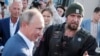 Президент России Владимир Путин и лидер «Ночных волков» Александр Залдостанов 