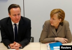 Дэвид Кэмерон и Ангела Меркель во второй день саммита ЕС в Брюсселе говорили о санкциях против России