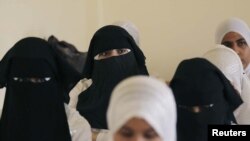 Female students attend a lecture at the Institute for Preparatory School Teachers in Ramadi in November 2010.