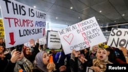 Demonstrators against the immigration rules implemented by U.S. President Donald Trump's administration, rally at Los Angeles international airport in Los Angeles on February 4.