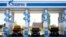 Vehicles are seen at a gas filling station, owned by Gazprom Transgaz Stavropol, with the company logo of Russian natural gas producer Gazprom on the station, in Stavropol