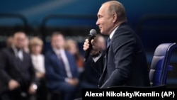 Ռուսաստանի գործող նախագահ, նախագահի թեկնածու Վլադիմիր Պուտինը Մոսկվայում նախընտրական հանդիպման ժամանակ, հունվար, 2018թ․