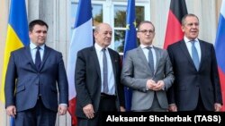 Очільники міністерств закордонних справ (зліва направо) України, Франції, Німеччини та Росії – Павло Клімкін, Гайко Маас, Жан-Ів Ле Дріан і Сергій Лавров, Берлін, 11 червня 2018 року