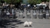 Polish KFOR members guard a municipal office in Zvecan in northern Kosovo on May 30. 