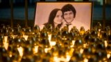 SLOVAKIA -- Light tributes placed during a silent protest in memory of murdered journalist Jan Kuciak and his girlfriend Martina Kusnirova, seen in photo, in Bratislava, Slovakia, on Wednesday, Feb. 28, 2018. 