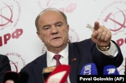 Russian Communist Party leader Gennady Zyuganov gestures while speaking at a news conference during the parliamentary elections in Moscow on September 19.