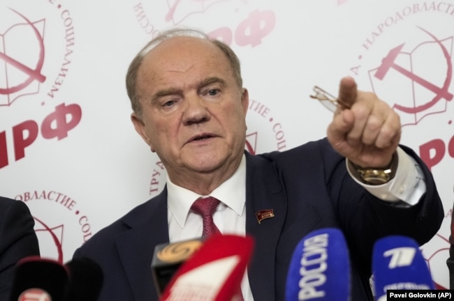 Russian Communist Party leader Gennady Zyuganov gestures while speaking at a news conference during the parliamentary elections in Moscow on September 19.