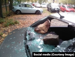 Earlier this month, local lawmaker Vitaly Tretyukhin found the rear window of his car smashed with a brick and a severed pig's head left behind.