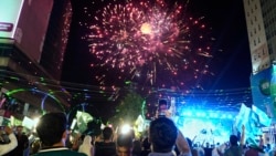 People in Lahore watch fireworks to show solidarity with the Pakistan Army on May 11.