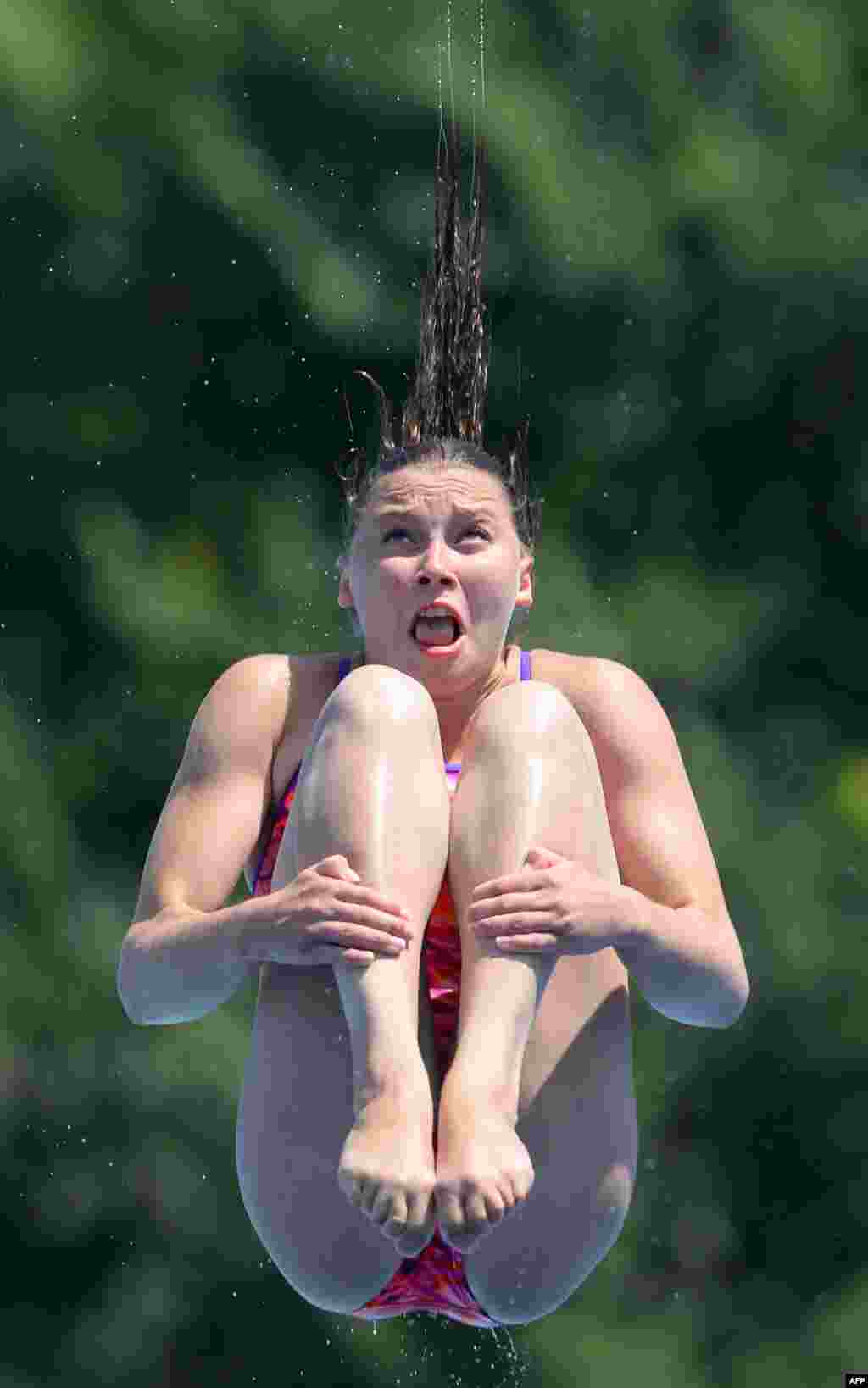 Russia's Daria Govor competes in the women's 1-meter springboard final diving event at the FINA World Championships in Barcelona. (AFP/Josep Lago)