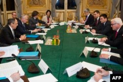 Russian Foreign Minister Sergei Lavrov (left), French Foreign Minister Jean-Marc Ayrault (second left), German Foreign Minister Frank-Walter Steinmeier (right) and Ukrainian Foreign Minister Pavlo Klimkin (second right) failed to make a breakthrough during talks in Paris about the situation in eastern Ukraine.