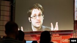 Эдвард Сноуден во время видеоконференции в Германии. 21 марта 2017 года.