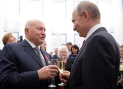 Luzhkov (left) was awarded with an Order of Merit for the Fatherland by President Vladimir Putin in 2016.