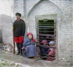 Men are held in the "debtors prison" inside the Bukhara dungeon.