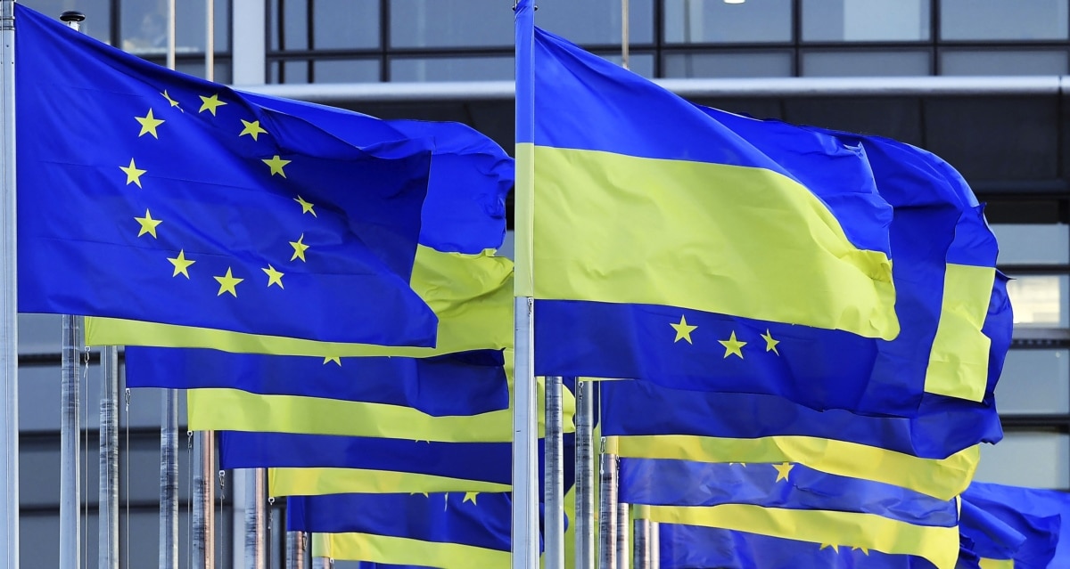 EU and Ukrainian flags outside the European Parliament in Strasbourg.