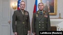 U.S. General Joe Dunford (left) and Russian General Valery Gerasimov at a meeting in 2018 in Finland