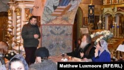 Father Aleksy Gomonov doles out advice to attendees of the Peter and Fevronia Club.