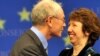 Belgian Prime Minsiter Herman Van Rompuy, the EU president-elect, kisses EU Trade Commissioner Catherine Ashton, who will head the High Representative for Foreign Affairs, after their selection on November 19.