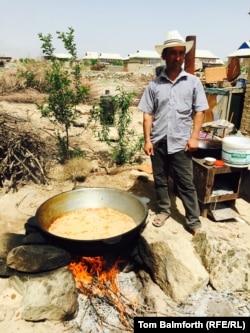 This man has been tasked with cooking the plov for the wedding. "Every cook of plov has his secret," he says.