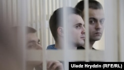 The three defendants (from left to right): Yauhen Baranouski, Anton Vyazhevich, and Yahor Skuratovich