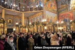 Orthodox Christmas celebrate Christmas in the Russian Orthodox cathedral in Astana in January 2021.