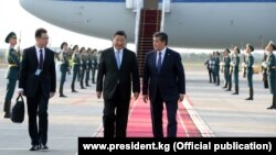 Chinese President Xi Jinping is greeted by his Kyrgyz counterpart, Sooronbai Jeenbekov, on a state visit to Bishkek last year. 