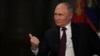 Russian President Vladimir Putin gestures during an interview with Tucker Carlson at the Kremlin on February 6.