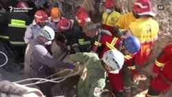 Iranian Rescuers Search For Earthquake Victims