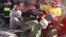 Iranian Rescuers Search For Earthquake Victims