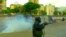 Venezuelan Police Fire Tear Gas At Antigovernment Protesters