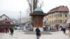 Bosnia and Herzegovina -- New epidemiological measures due to coronavirus pandemic in Sarajevo (Bascarsija, Sebilj, people, walking, snow, winter), March 22, 2021.