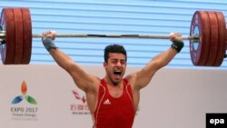 Iran's Kianoush Rostami set a new world record and won a first gold medal for Iran at the 2016 Rio Olympics on August 12.