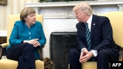 Ангела Меркель (слева) и Дональд Трамп. Вашингтон, 17 марта 2017 года.
