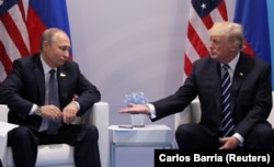 Владимир Путин и Дональд Трамп на саммите G-20 в Гамбурге. 7 июля 2017 года