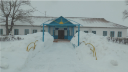 The school in the village of Starobelka where Nurbol Onerkhan worked as a history teacher. (file photo)