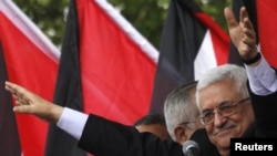 Palestinian Authority President Mahmud Abbas waves to the crowd during a celebration in the West Bank city of Ramallah in September.