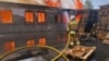 Тушение пожара в Киевской области после российских ударов по Украине в ночь на 9 июля