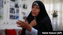 Faezeh Hashemi, the activist daughter of Iran's late President Akbar Hashemi Rafsanjani, speaks in an interview with The Associated Press, in Tehran, September 6, 2018