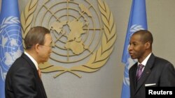Ivory Coast's UN Ambassador Youssoufou Bamba (right) presents his credentials to UN Secretary-General Ban Ki-moon at UN headquarters in New York.