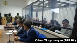 Оглашение приговора 14 казахстанцам, вывезенным спецслужбами из Сирии и обвиненным на родине в участии в боях на стороне террористической организации. Нур-Султан, 11 декабря 2019 года.