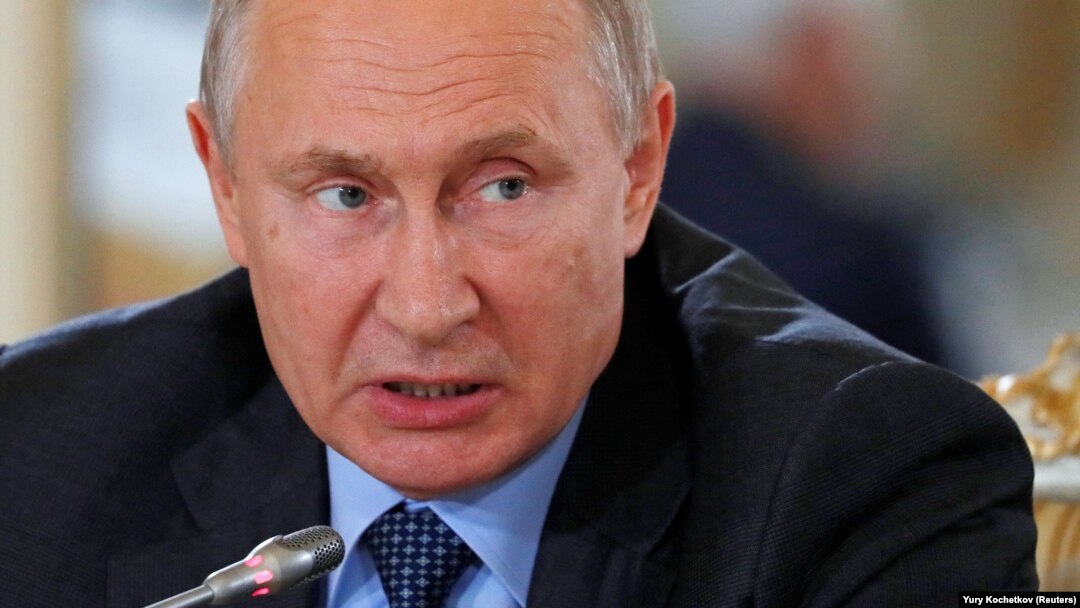 Russian President Vladimir Putin speaks during a meetings with members of the Russian Direct Investment Fund (RDIF) and representatives of the international investment community on the sidelines of the St. Petersburg International Economic Forum on June 6.
