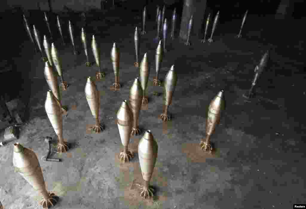 Improvised mortar shells are seen inside a weapons factory in the northwestern Syrian city of Idlib. (Reuters/Khalil Ashawi)