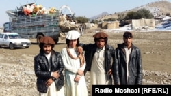 FILE: Some displaced Waziristan residents posing for a photo near the Gulan camp in Afghanistan's southeastern province of Khost.