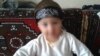 A young baby wearing an Islamic State headband. This photo was posted on the Russian social network VKontakte by a man named Artyom from Kazakhstan who says he is fighting for IS. 
